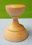Rounded support for sphere or egg 